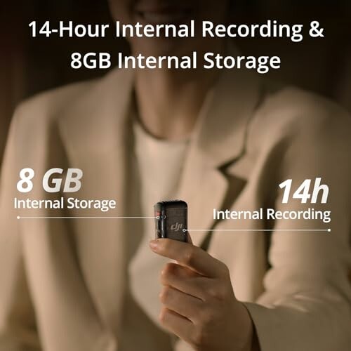 Person holding a digital recorder with 14-hour recording and 8GB storage capabilities.