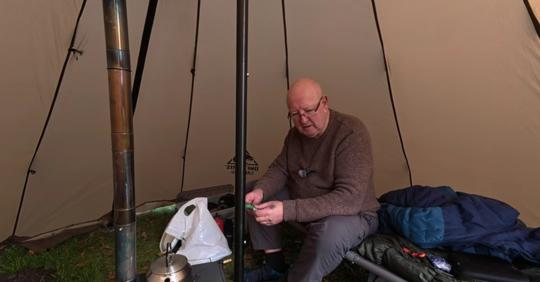 Ian testing the OneTigris Rock Fortress Hot Tent during a real overnight camping trip